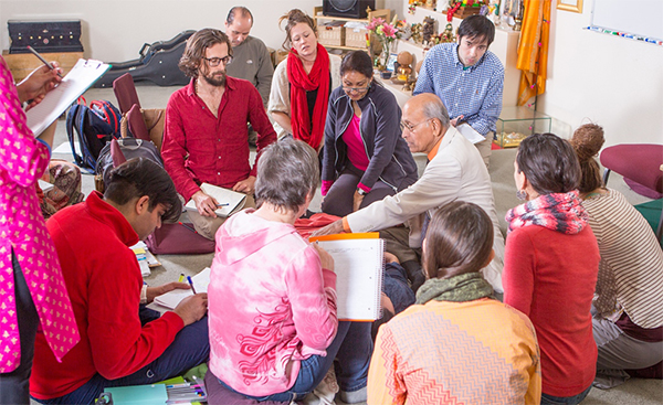 Dr. Vasant Lad teaching Ayurvedic assessment in a classroom setting